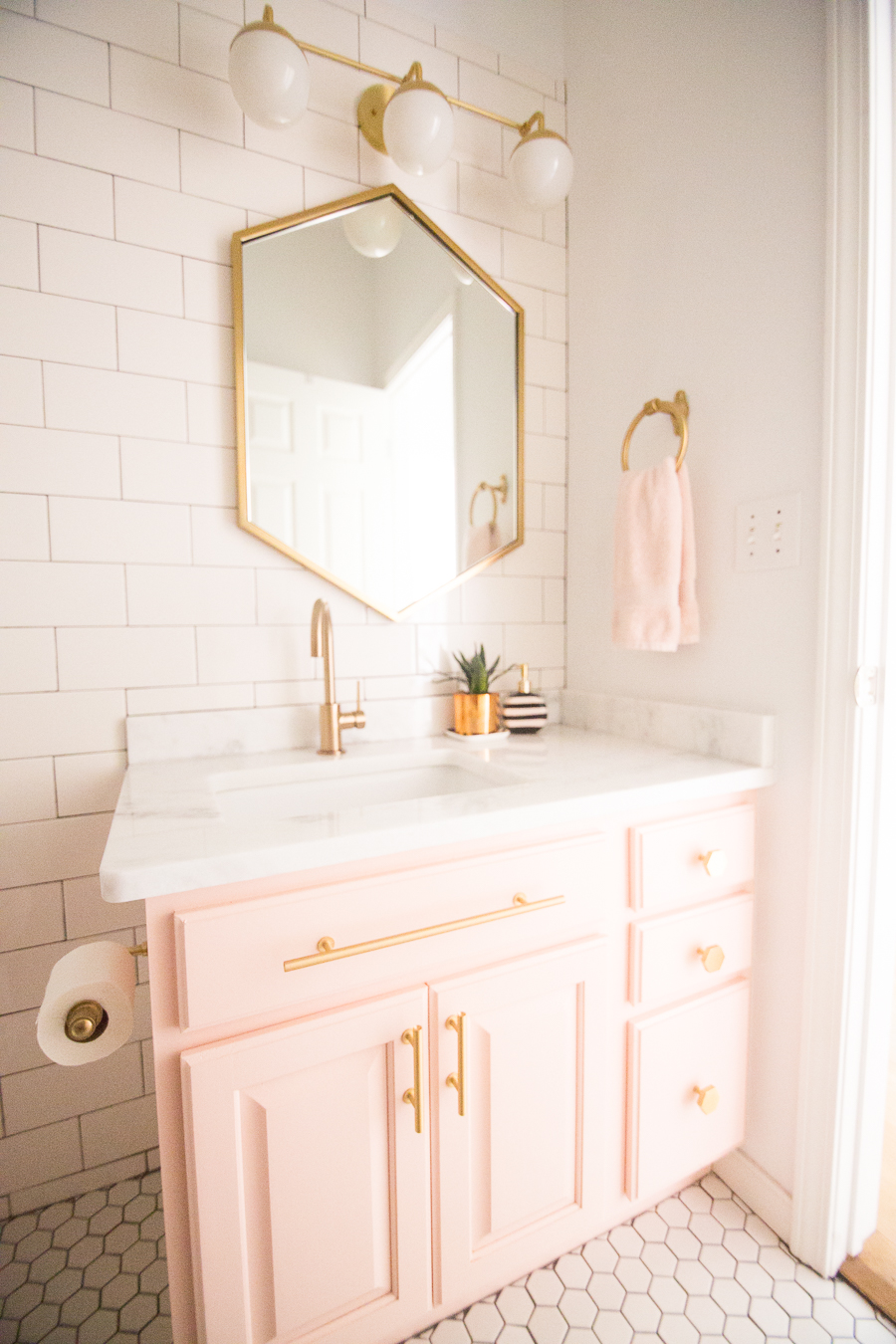 Modern Glam Blush Girls Bathroom Design gold hexagon mirror blush ...
