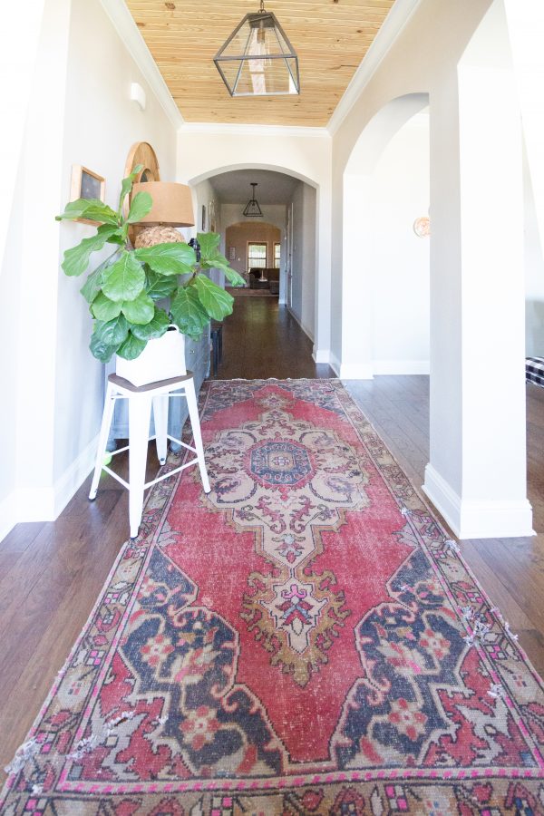 10 Beautiful Faux Fiddle Leaf Fig Trees for Home Decor vintage kilim rug beautiful entryway ideas wood ceiling treatment entry white walls