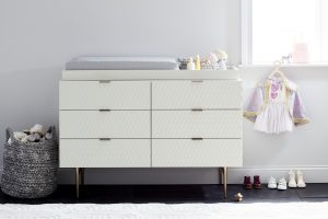 white and gold changing table