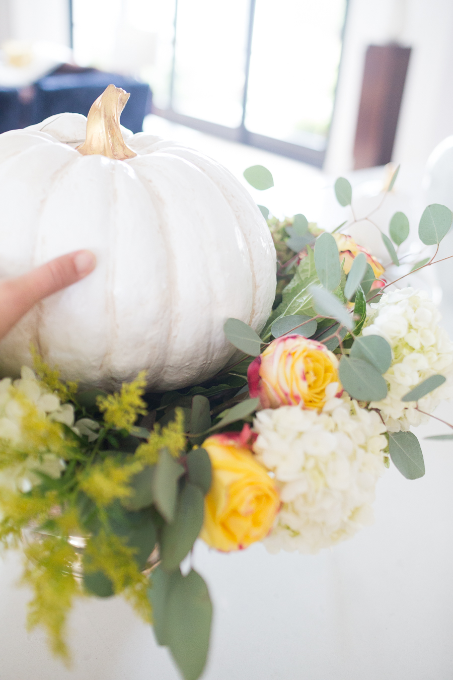 DIY Silver Urn Pumpkin Centerpiece for Fall floral sponges inside of a silver urn for a DIY fall centerpiece