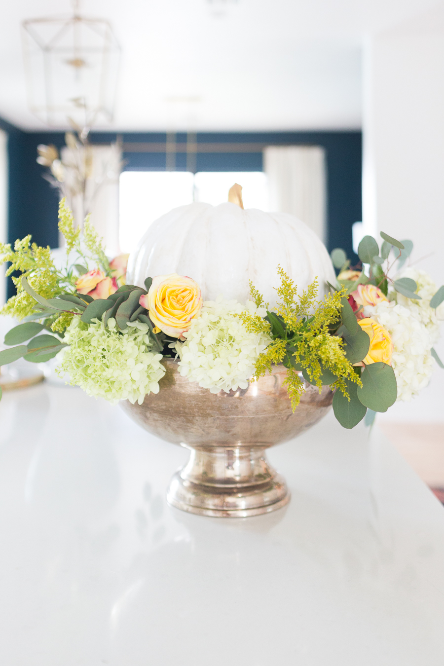 DIY Silver Urn Pumpkin Centerpiece for Fall floral sponges inside of a silver urn for a DIY fall centerpiece