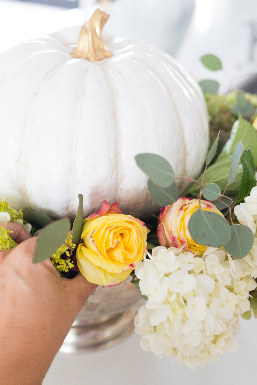 DIY Silver Urn Pumpkin Centerpiece for Fall floral sponges inside of a silver urn for a DIY fall centerpiece