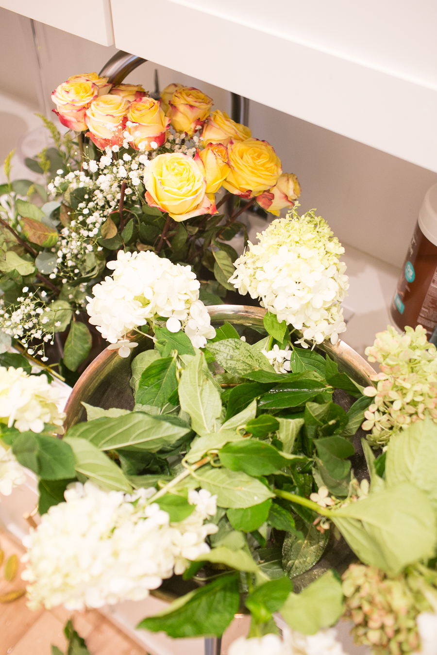 DIY Silver Urn Pumpkin Centerpiece for Fall floral sponges inside of a silver urn for a DIY fall centerpiece