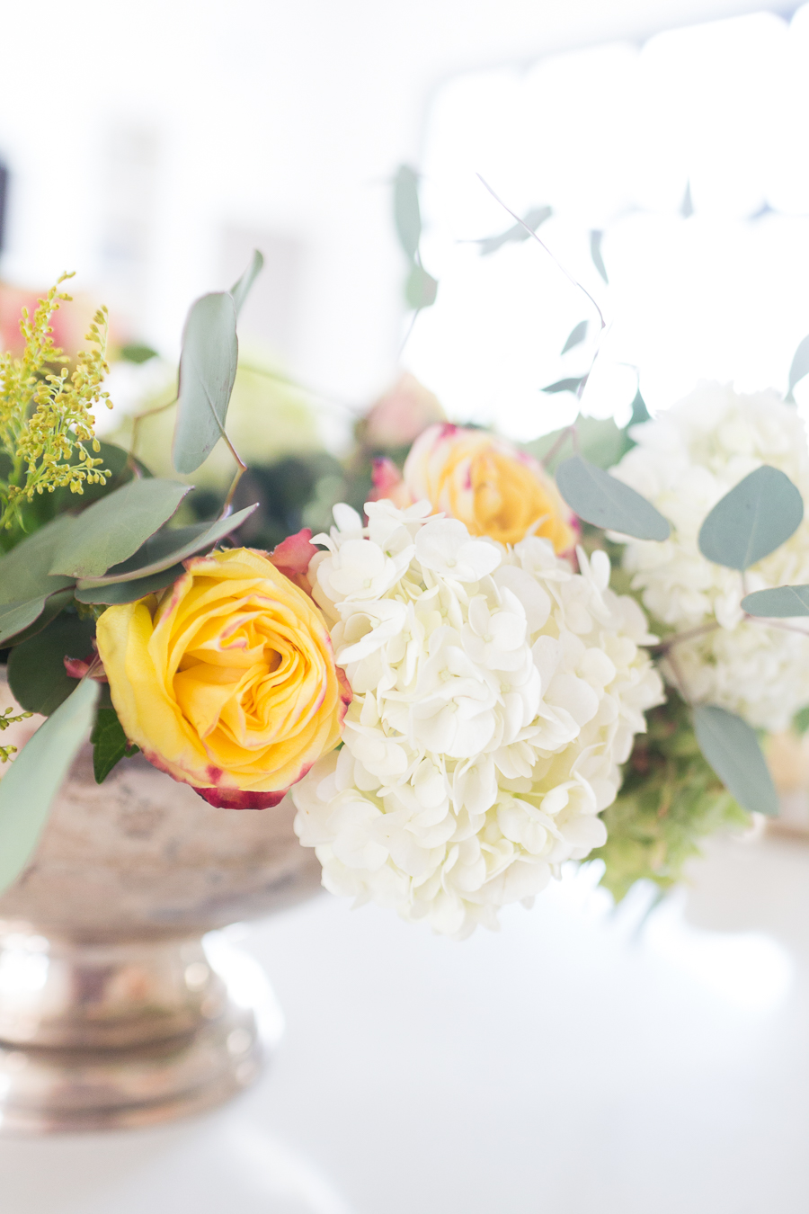 DIY Silver Urn Pumpkin Centerpiece for Fall floral sponges inside of a silver urn for a DIY fall centerpiece