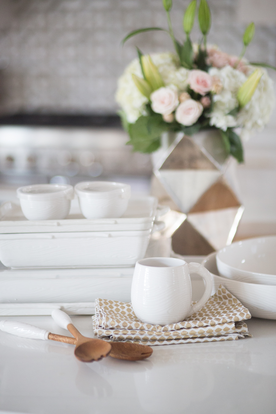 The Woodland Collection by Tara at Home at QVC white baking dishes and wooden spoons with a gorgeous floral arrangement 