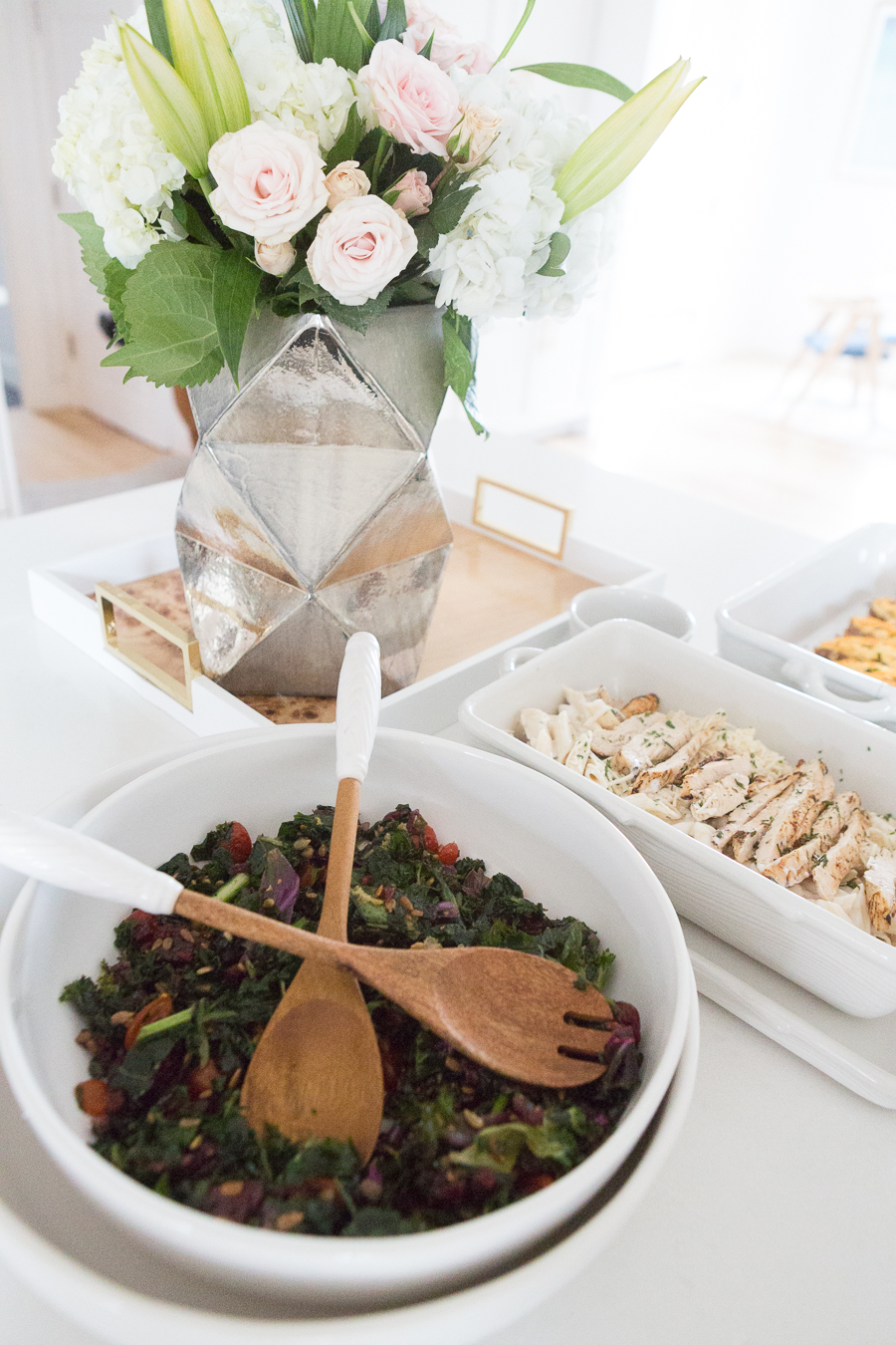 The Woodland Collection by Tara at Home at QVC displaying the wooden salad spoons in a chopped salad on the kitchen counters