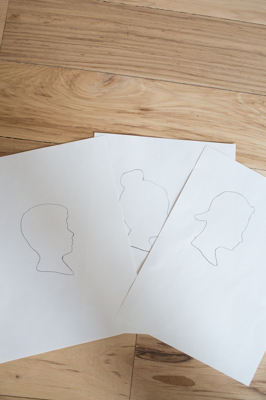 three different silhouette drawings