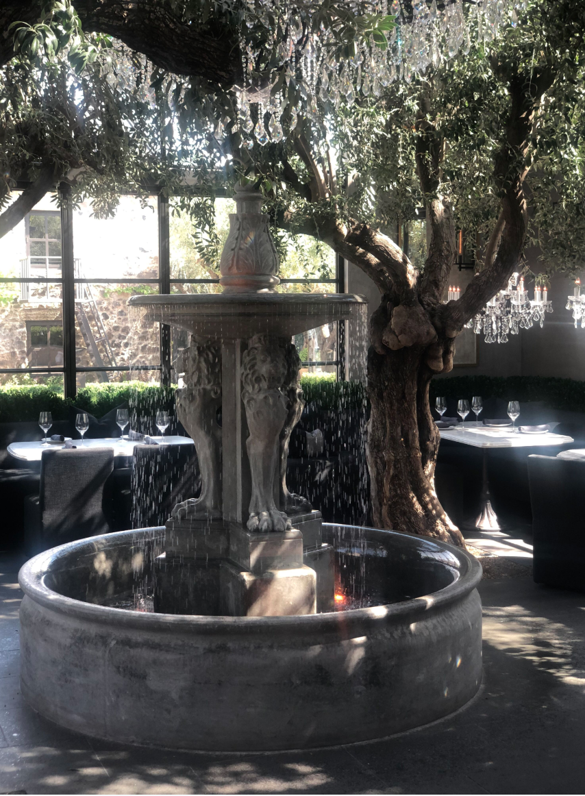 fountain with water inside restoration hardware restaurant