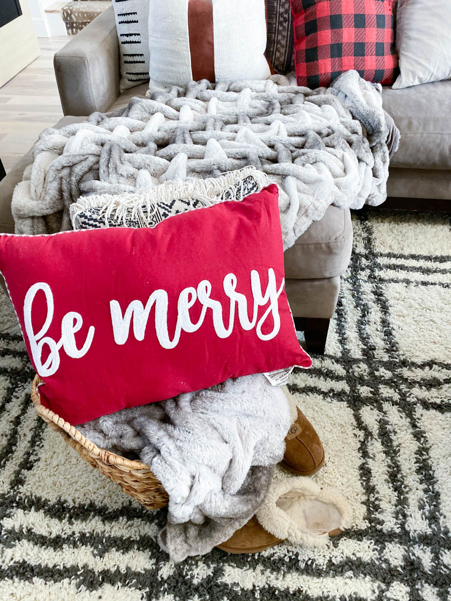 Affordable Buffalo Plaid Holiday Pillows and Decor buffalo plaid pillows and tabletop Christmas trees on a round wood coffee table-2