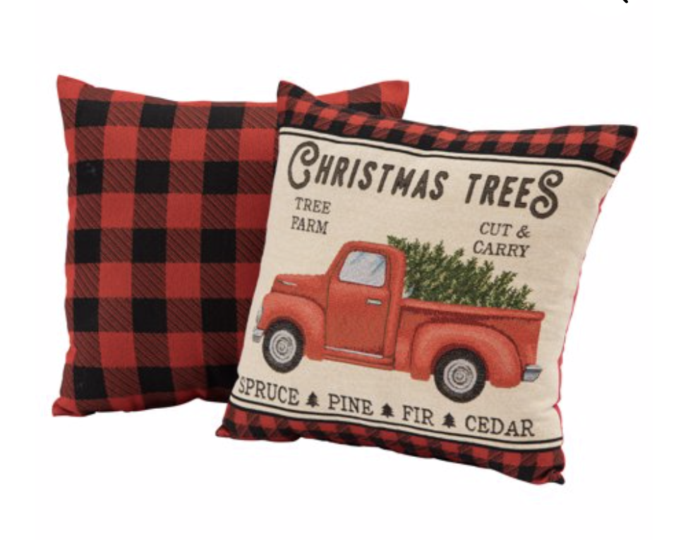 Affordable Buffalo Plaid Holiday Pillows and Decor buffalo plaid pillows and tabletop Christmas trees on a round wood coffee table-7