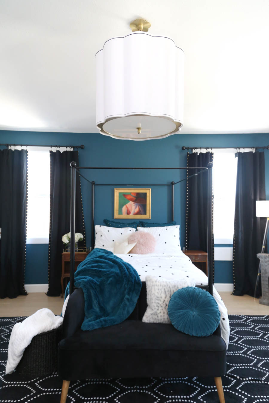 CC and Mike Frisco I Project Reveal teal Galapagos torquiest girls bedroom and bathroom design with black curtains and a black canopy bed and custom vogue womens art above the bed 