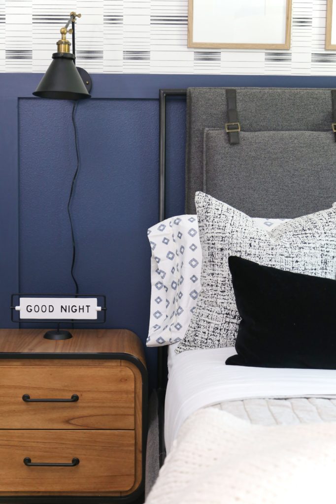A mid-century modern nightstand and an antique-inspired wall lamp for a Teen Bedroom Reveal